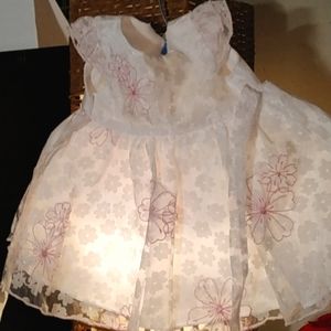 Adorable girl white lace dress with pink stitching